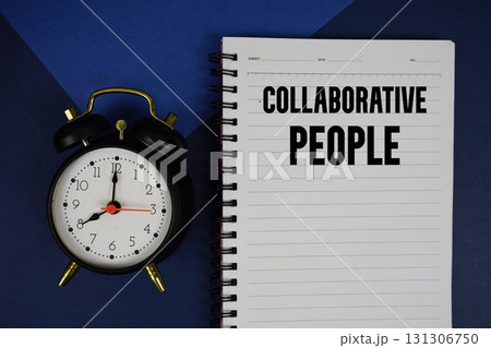 Collaborative People text written on notepad with alarm clock on blue background 131306750