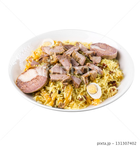 Isolated plate of pilaf with kazy and quail eggs Isolated plate of pilaf with kazy and quail eggs 131307402