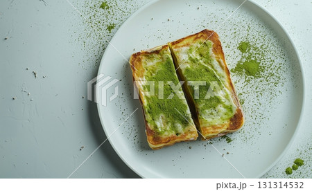 Matcha toast green topping flour for simple breakfast on white plate 131314532