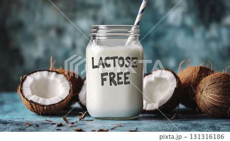 Dairy free coconut milk tropical fruit fresh on glass jar 131316186