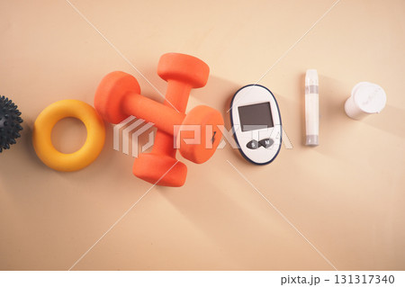 Fitness tools and health devices on neutral background Fitness tools and health devices on neutral background 131317340