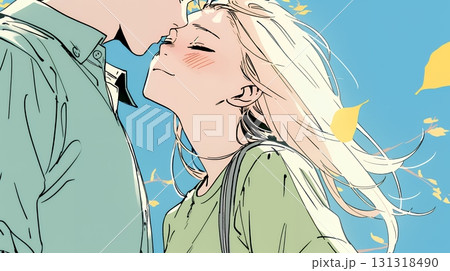 秋の紅葉の下でキスをしている若い恋人たち