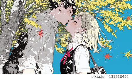 秋の紅葉の下でキスをしている若い恋人たち 131318493