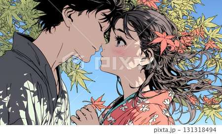 秋の紅葉の下でキスをしている若い恋人たち