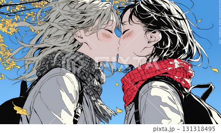 秋の紅葉の下でキスをしている若い恋人たち