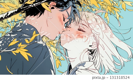 秋の紅葉の下でキスをしている若い恋人たち