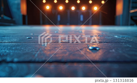 Empty stage floor reflecting warm lights in theater 131318816