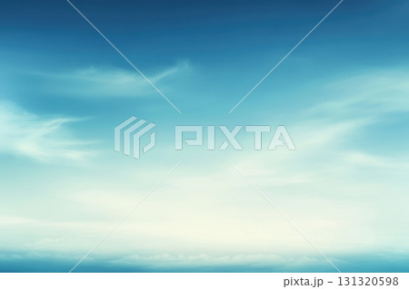 Soft blue sky with wispy clouds at dawn over a tranquil horizon Soft blue sky with wispy clouds at dawn over a tranquil horizon 131320598