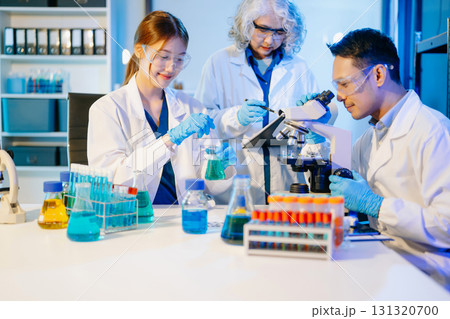 Scientist team with tablet and laptop, laboratory and ecofriendly science. Agriculture, research and scientists 131320700