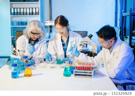 Scientist team with tablet and laptop, laboratory and ecofriendly science. Agriculture, research and scientists 131320929