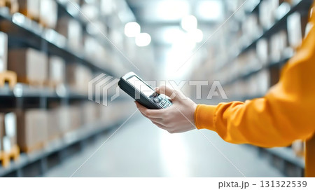 Efficient warehouse worker using scanner to manage shipments and inventory 131322539
