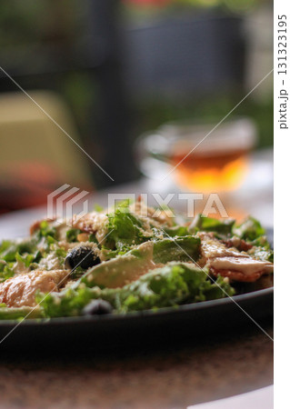 Chicken Caesar salad close-up 131323195