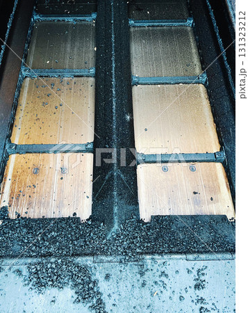 Industrial metal surface with debris 131323212
