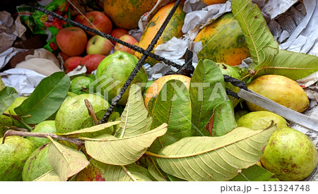 Fresh Ripe Guavas with Leaves Displayed at Local Market Fresh Ripe Guavas with Leaves Displayed at Local Market 131324748