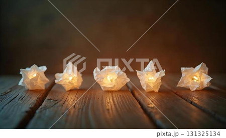 A light bulb amidst crumpled paper, highlighting creativity and learning in back-to-school and graduation themes 131325134