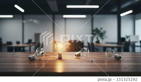 A table filled with light bulbs, highlighting the theme of ideas and success in a collaborative office setting 131325292