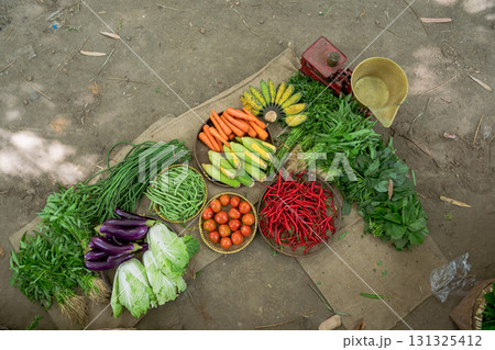 Beautiful Fresh Organic Vegetables on Display at the Local and Vibrant Market Stall Beautiful Fresh Organic Vegetables on Display at the Local and Vibrant Market Stall 131325412