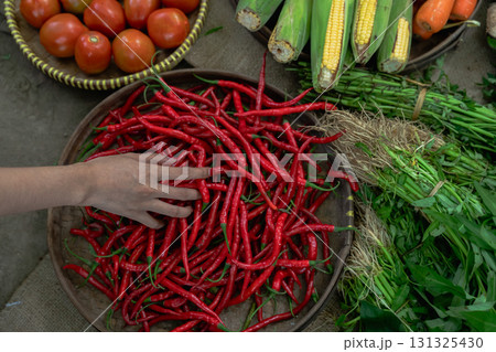 Discover Fresh Produce at the Local Market A Dazzling Array of Vibrant Spices with Vegetables 131325430