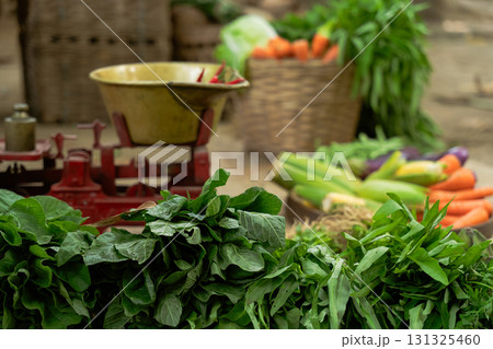 Discover an array of Fresh Organic Vegetables available at our charming Market Stall today Discover an array of Fresh Organic Vegetables available at our charming Market Stall today 131325460