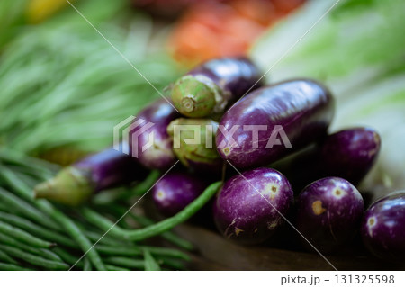 Discover a Vibrant Collection of Fresh Eggplants Available at a Local Farmers Market 131325598
