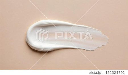 White facial cream displayed on a beige background, emphasizing its role in skincare and dermatology White facial cream displayed on a beige background, emphasizing its role in skincare and dermatology 131325792