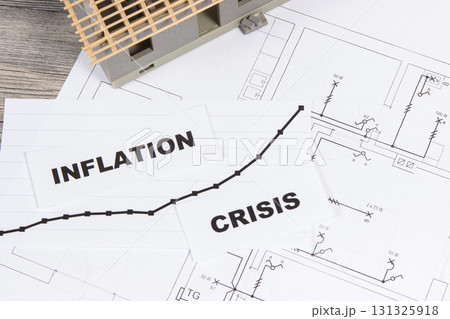 Inscriptions crisis and inflation, small house under construction 131325918