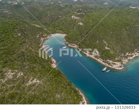 Aerial view marina cape Bonifacio south Corsica France citadel on rocky promontory on wild white limestone cliffs 131326033