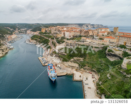 Aerial view marina cape Bonifacio south Corsica France citadel on rocky promontory on wild white limestone cliffs Aerial view marina cape Bonifacio south Corsica France citadel on rocky promontory on wild white limestone cliffs 131326058
