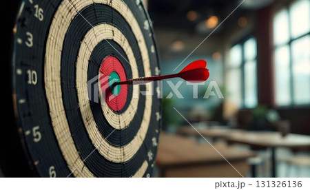 A dart on a dartboard illustrates the concepts of achievement and strategic problem-solving 131326136