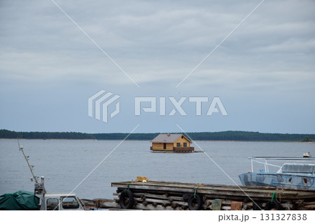 A Floating Home set on a serene lake truly invites feelings of tranquility and adventure for all 131327838