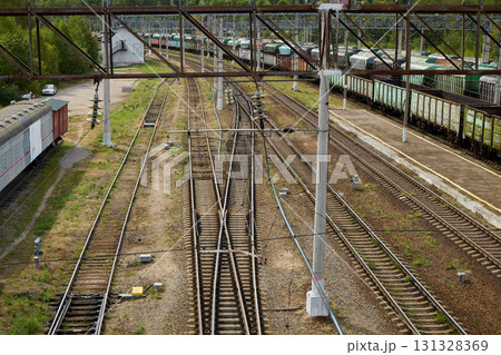 An Aerial Perspective Showing Train Tracks Alongside Freight Cars Located in a Rail Yard 131328369
