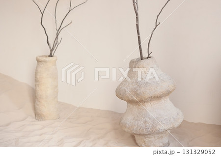 Artistic Vases Featuring Beautiful Branches in a Minimalist Interior Setting for Elegance 131329052