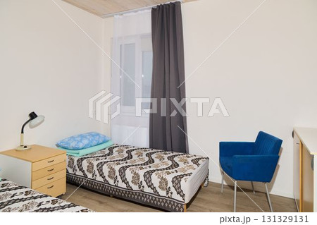 A Cozy Bedroom Featuring Elegant Decor, Beautiful Natural Light, and an Inviting Atmosphere 131329131