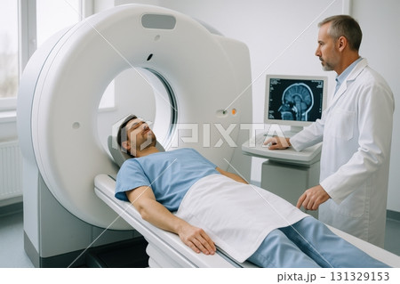 CT Scan Procedure: A Medical Professional Assists a Patient During Imaging CT Scan Procedure: A Medical Professional Assists a Patient During Imaging 131329153