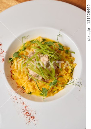 Enjoy Gourmet Risotto with Fresh Herbs and a Creamy Sauce that delights the palate Enjoy Gourmet Risotto with Fresh Herbs and a Creamy Sauce that delights the palate 131329469
