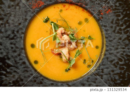 Enjoy Delicious Gourmet Soup made with Fresh Ingredients and a Garnish for enhanced flavor 131329534
