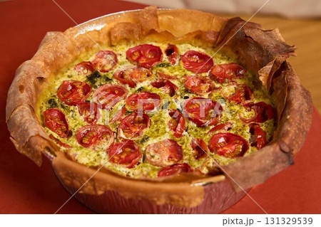 Enjoy this delicious Tomato Quiche featuring a perfectly crispy crust that everyone will love Enjoy this delicious Tomato Quiche featuring a perfectly crispy crust that everyone will love 131329539