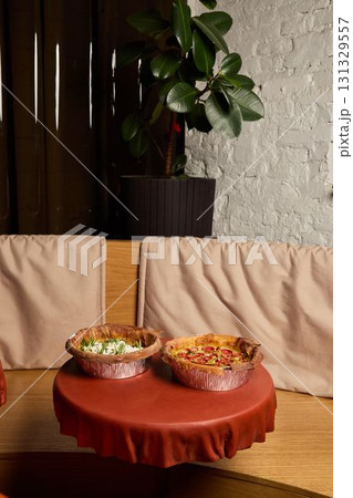 A Variety of Delicious Dishes Elegantly Served on a Beautifully Set Table for Guests A Variety of Delicious Dishes Elegantly Served on a Beautifully Set Table for Guests 131329557