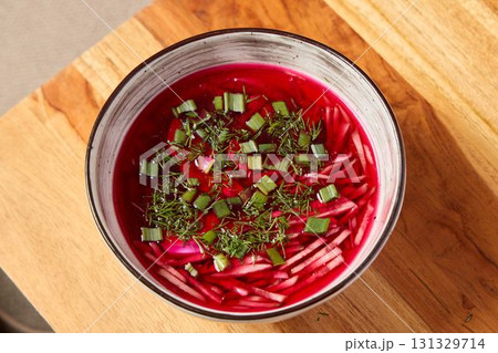 Enjoy a deliciously vibrant Beetroot Soup, made with fresh herbs and colorful vegetables Enjoy a deliciously vibrant Beetroot Soup, made with fresh herbs and colorful vegetables 131329714
