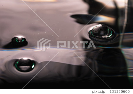 248.Three Glossy Bubbles on Reflective Dark Surface 131330600