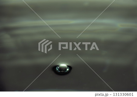 187.Single Water Droplet on Dark Reflective Surface 187.Single Water Droplet on Dark Reflective Surface 131330601
