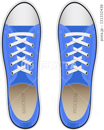 Two blue canvas sneakers with white laces are viewed from above on a black background. 131332436