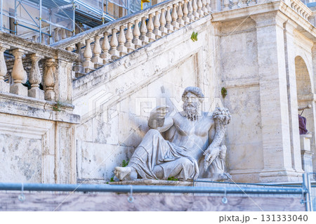 Statue with horn of plenty in Piazza del Campidoglio, in Rome Statue with horn of plenty in Piazza del Campidoglio, in Rome 131333040
