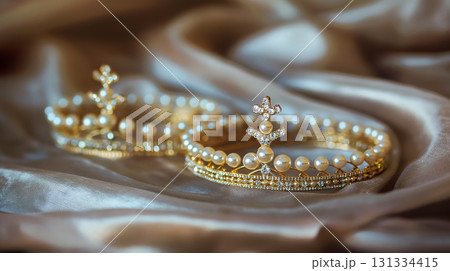 Miniature crowns on luxurious fabric. 131334415