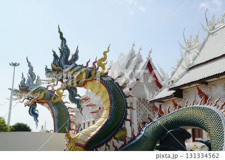 Wat Nong Jab Tao is a temple with a beautiful white ordination hall. It stands out with its beautiful stucco art of Naga sculptures in the surrounding area. Wat Nong Jab Tao is a temple with a beautiful white ordination hall. It stands out with its beautiful stucco art of Naga sculptures in the surrounding area. 131334562