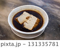 Serving of tofu in gravy, is simple and popular teochew porridge dish 131335781