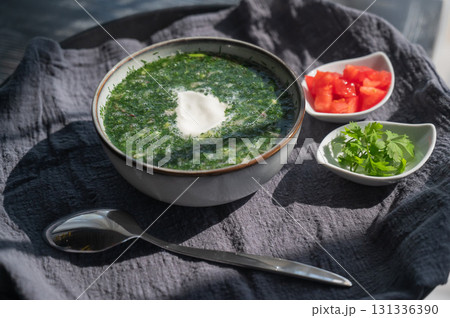 Traditional Russian lunch in a cafe. Top view of okroshka. Traditional Russian lunch in a cafe. Top view of okroshka. 131336390