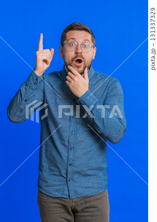 Inspired young man having good idea, plan, startup, showing inspiration motivation Eureka gesture 131337329