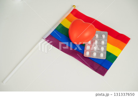 Rainbow flag, pills, heart and stethoscope. 131337650