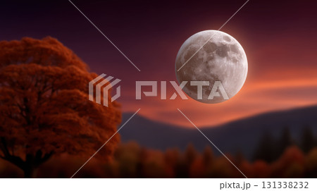 Glowing full moon illuminates serene autumn night sky with silhouette of tree and distant hills Glowing full moon illuminates serene autumn night sky with silhouette of tree and distant hills 131338232